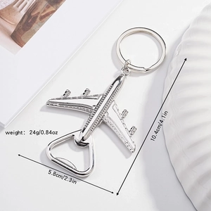 Detailed dimensions of silver airplane bottle opener keychain showing weight and size