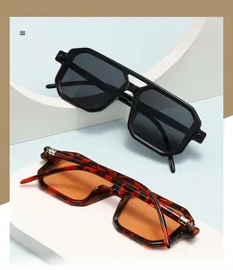 Close-up of polarized sunglasses showing metallic hinge detail and leopard print frames