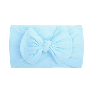 Detailed view of light blue soft nylon baby headband with a large folded bow decoration