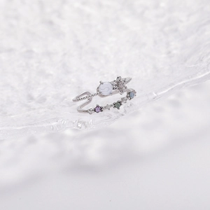 Detail of silver double-layer open ring with crystal flower and moonstone inlay