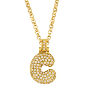 Macro shot of gold bubble letter C pendant with sparkling pave rhinestones on rolo chain