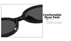 Detail view of the comfortable integrated nose pads on black oval sunglasses