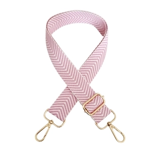 Detail of pink and white herringbone pattern wide strap with adjustable gold metal buckle