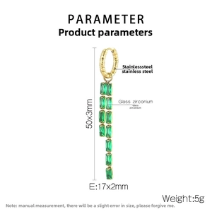 Detailed view of long 18K gold-plated tassel earring with green zirconia stones