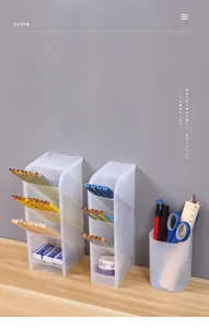 Close-up of translucent frosted desk organizer set with multi-tier slanted pen holders