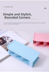 Detail of pink and blue tiered desk organizers showing rounded edges and multi-slot design