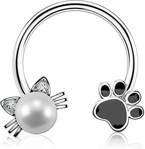 Detail of silver nose hoop with white pearl cat face and black enamel paw design