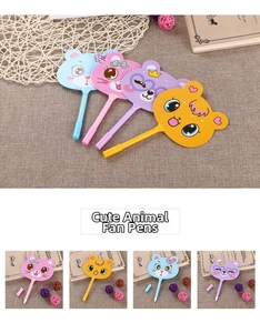 Detail of four colorful cat-shaped fan pens in pink, yellow, blue, and purple plastic