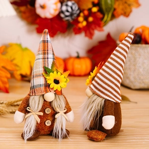 Fall gnome plush set with sunflower hats and maple leaf decor for Thanksgiving display