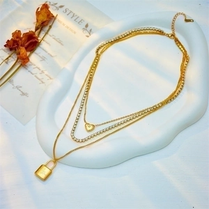 Three-layer gold titanium necklace with heart pendant and engraved love you lock