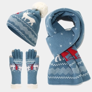 Detail of grey-blue winter set with white reindeer jacquard and soft fleece lining