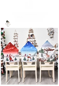 Detailed view of festive Christmas chair covers with Santa, Snowman and Reindeer prints