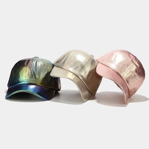 Detailed close-up of rainbow, gold, and pink metallic PU baseball caps with glossy finish