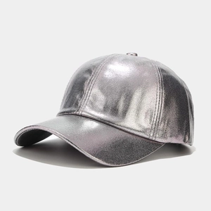 Detail of silver metallic textured baseball cap with futuristic holographic finish