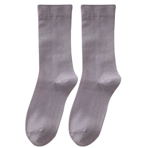 Pair of Morandi gray-purple cotton crew socks with soft knitted texture on white background