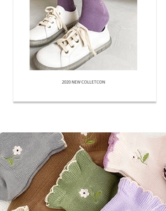 Close-up of cotton socks with floral embroidery, wavy cuffs, and retro styling details
