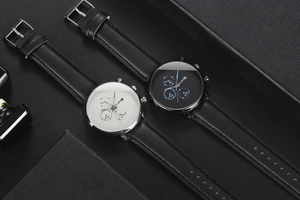 Detail of luxury men's quartz watches with chronograph dials and black leather straps