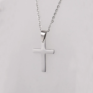 Polished silver stainless steel cross pendant necklace with a classic link chain for unisex