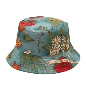 Reversible bucket hat with marine floral print and blue teal background