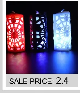 Detail of LED Halloween spider web candle lights with red purple and white glowing effects