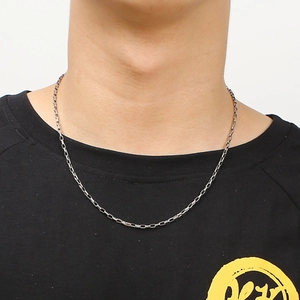 Men's minimalist stainless steel rectangle box chain necklace worn on black t-shirt