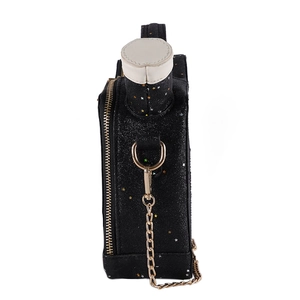 Detail view of a creative bottle-shaped bag with black sequins and gold chain strap