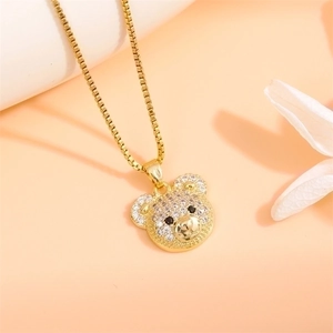 Charming gold-plated bear pendant necklace with sparkling cubic zirconia on a box chain