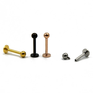 Detail showing various colors and internal thread structure of stainless steel labret studs