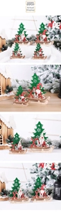 Detail of DIY wooden Christmas sleigh ornament with Santa and laser cut Xmas tree