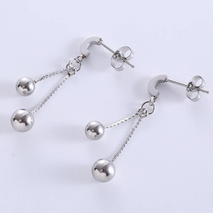 Sleek silver metal C-shape stud earrings with dangling bead chains on white background