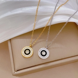 Titanium steel minimalist round pendant necklaces in gold and silver with CZ crystals