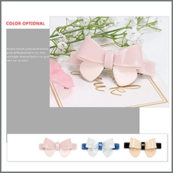 Detail view of acetate bow hair clips in pink, blue, and beige colors with spring closure