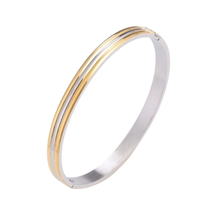 Elegant two-tone gold and silver stainless steel hinged bangle for women with smooth finish
