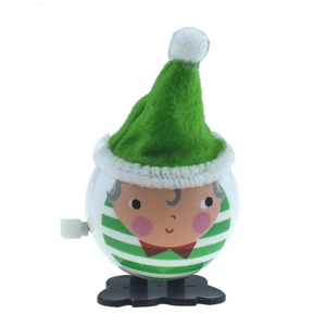 Detailed view of clockwork elf toy with green striped body and pointed felt hat