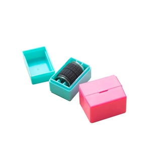 Portable privacy protection roller stamp set in pink and blue for secure data masking