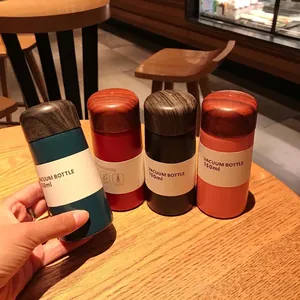 Mini 150ml matte vacuum insulated bottle with wood grain lid in four stylish colors