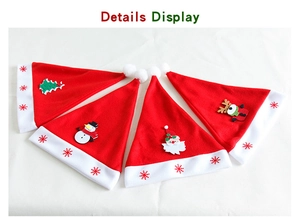 Detailed flat lay of 4 velvet Christmas hats featuring Santa, tree, snowman, and reindeer