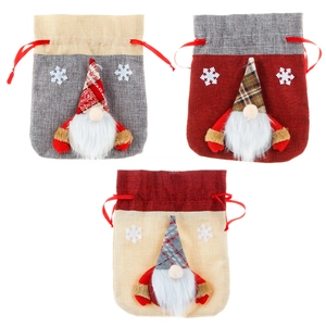 Three Christmas burlap gnome gift bags with drawstring closure and snowflake embroidery