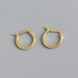 Close-up of gold-plated S925 sterling silver hoop earrings with sparkling zircon stones