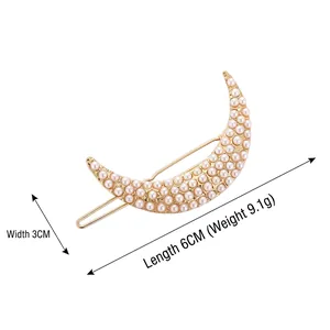 Elegant gold crescent moon hair clip with white pearls, size 6cm by 3cm, weighing 9.1g