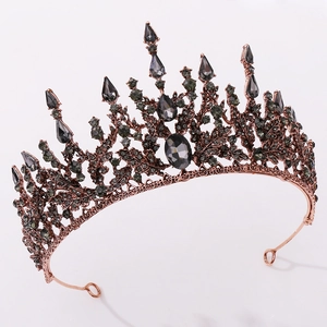 Detail of baroque bridal tiara with dark grey crystals and bronze filigree metalwork
