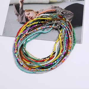 Bohemian colorful seed bead necklaces with silver lobster clasps on a stylish white background