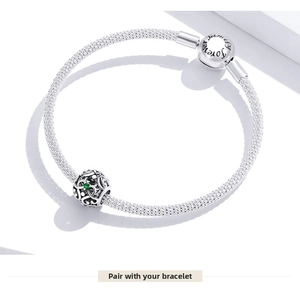 Close-up of S925 silver mesh bracelet with Family Forever clasp and green stone charm