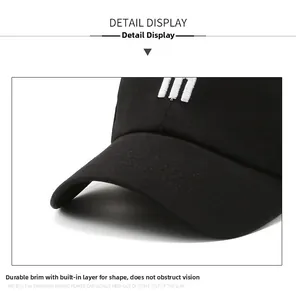 Detail of baseball cap with durable curved brim and high-quality white letter embroidery