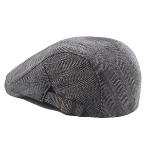 Deep grey herringbone cotton newsboy cap for men featuring adjustable bronze buckle
