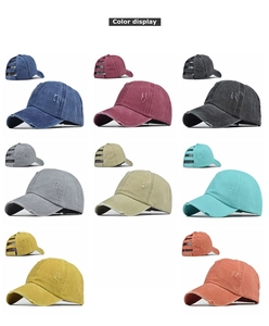 Detail of eight washed cotton ponytail baseball caps showing distressed finish and colors