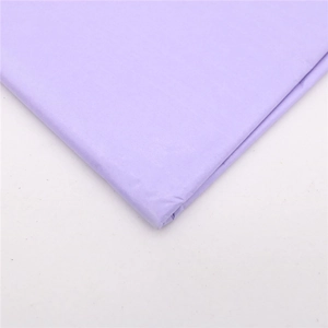Detail shot of light purple laser glitter tissue paper with glossy reflective finish
