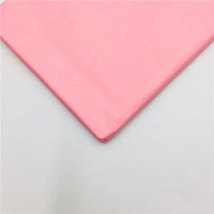 Detail view of pink laser glitter tissue paper showing subtle texture and shimmer