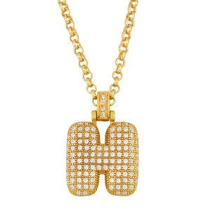 Detailed view of gold plated H letter pendant with pave set cubic zirconia stones