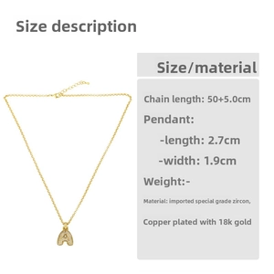 Detail of 18K gold plated letter A pendant with cubic zirconia inlay and 50+5cm chain